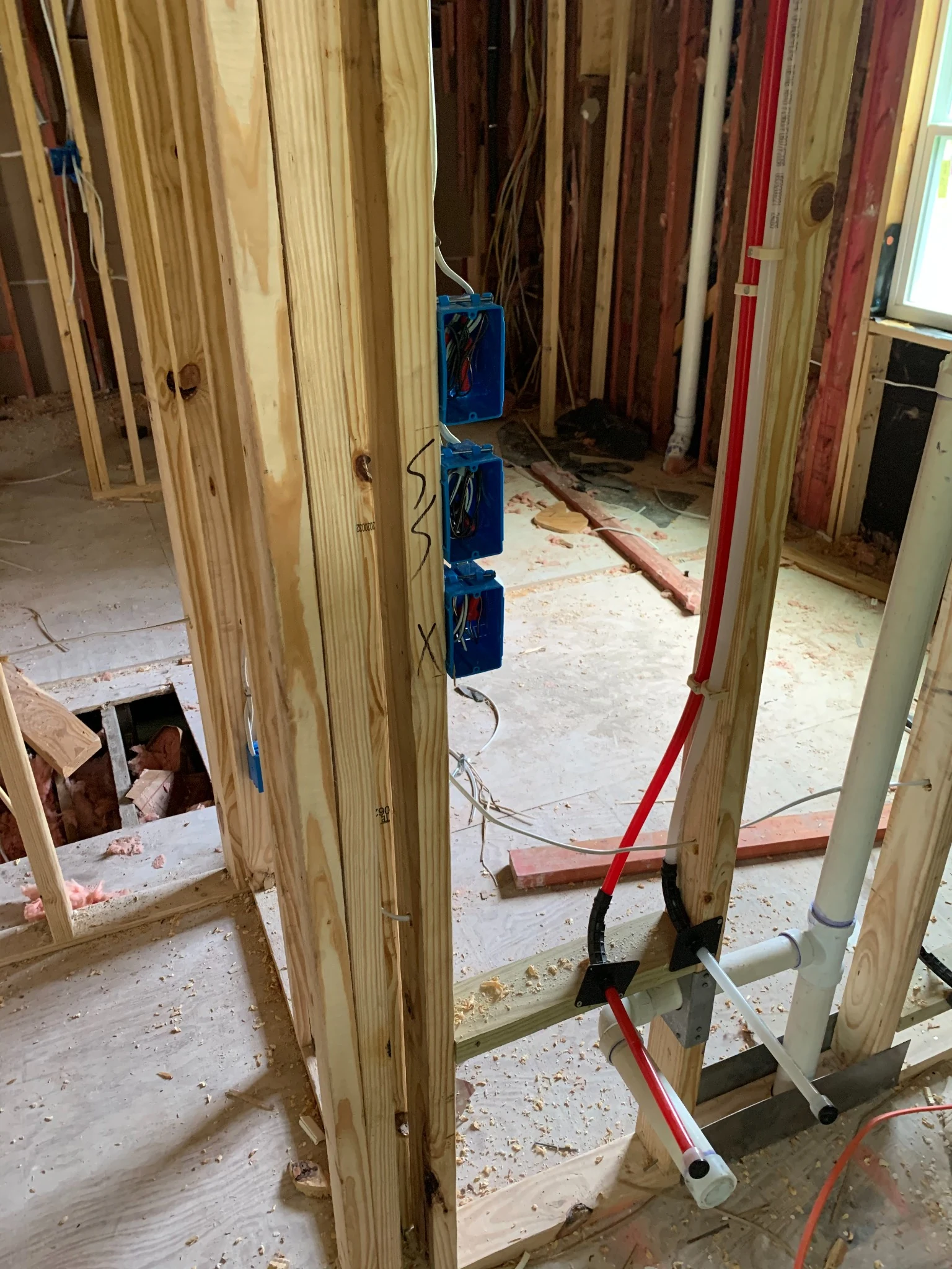 Electrical rough-in and panel work during construction