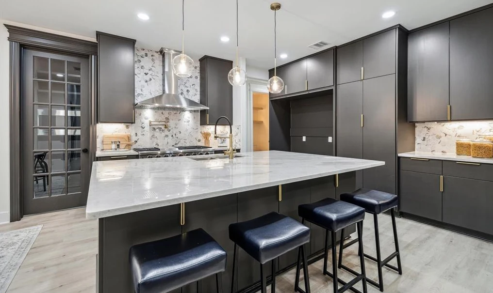 Custom kitchen with dark cabinetry